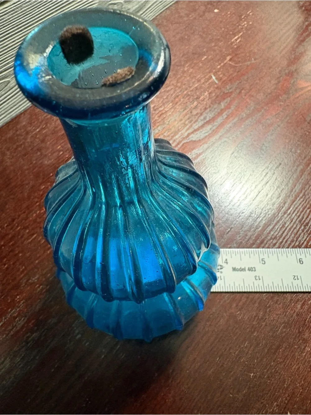 Vintage Blue Glass Decanter 100% recycled glass with a textured diamond pattern.